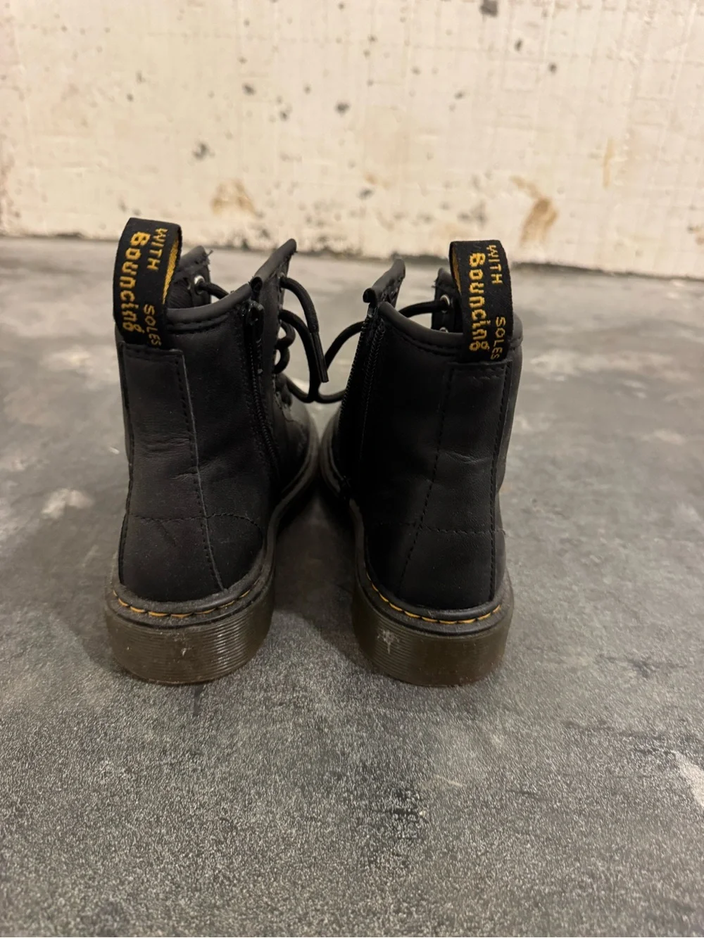 Dr. Martens Black Lace-Up Combat Boots with Yellow Stitching